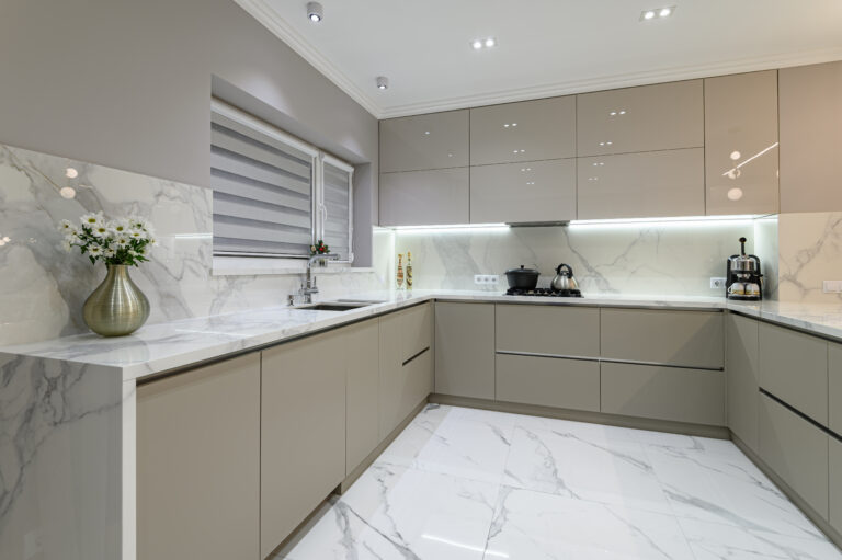 Luxury large modern white marble kitchen united with dining room